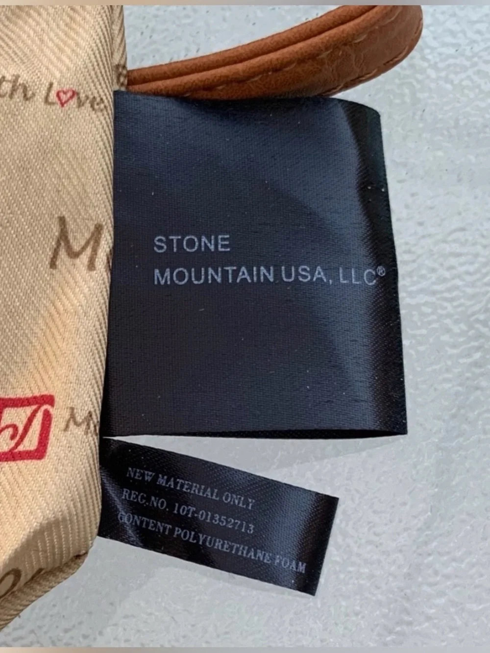 Stone Mountain USA Black and White Bonded Leather Convertible Crossbody Bag